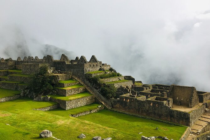 2-Day Sacred Valley & Machu Picchu by Train - Small Group Tour - Pisac archaeological park: terraces, water channels, and stone living