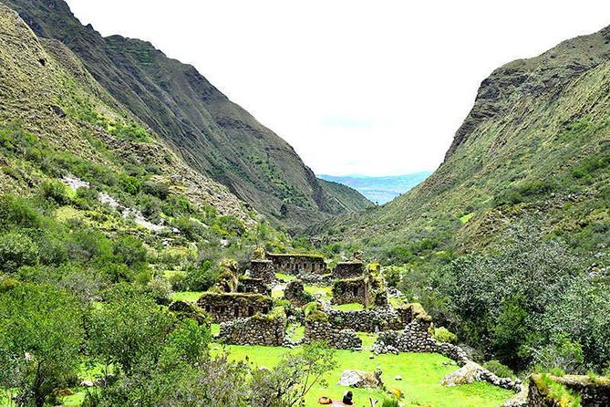 4-Day Lares Trek to Machu Picchu - The 14,000-foot high point: Day 2 pass views and Yanacocha’s dark reflection