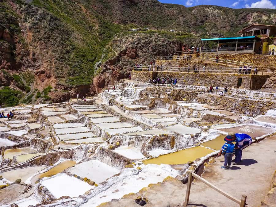 Cusco: Moray, Maras Salt Mines, and Chinchero Weavers Tour - Maras village and thin-stoned colonial architecture