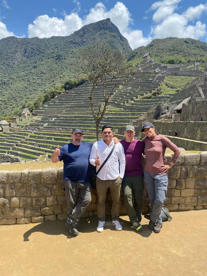 From Aguas Calientes: Machu Picchu guided tour with tickets - Getting From Aguas Calientes to Machu Picchu: Buses, Timed Entry, and Real-World Passport Checks