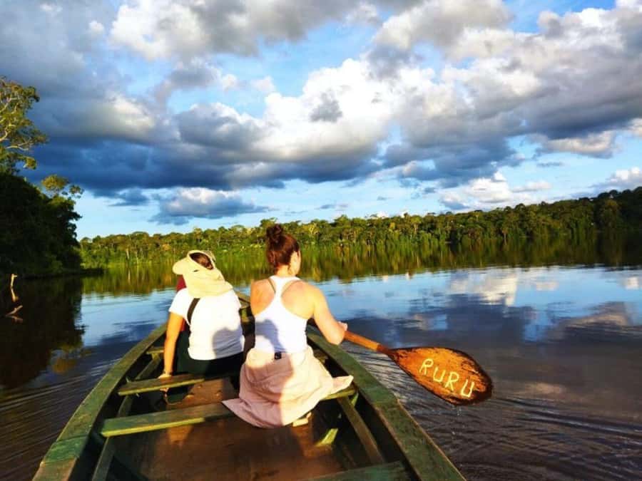 From Cusco: Amazon jungle for two days with sleeper bus and private lodge - Day 1: conservation forest walk, zip-line option, and river wildlife at sunset