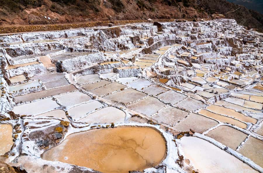 From Ollantaytambo:Private tour to Maras and Moray half day - Salineras de Maras salt mines: a working hillside you can photograph