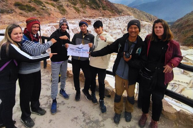 Moray and Maras Salt Mines Full Day Tour - Small Groups - Maras town: fast views, colonial-style doors, and Andean continuity