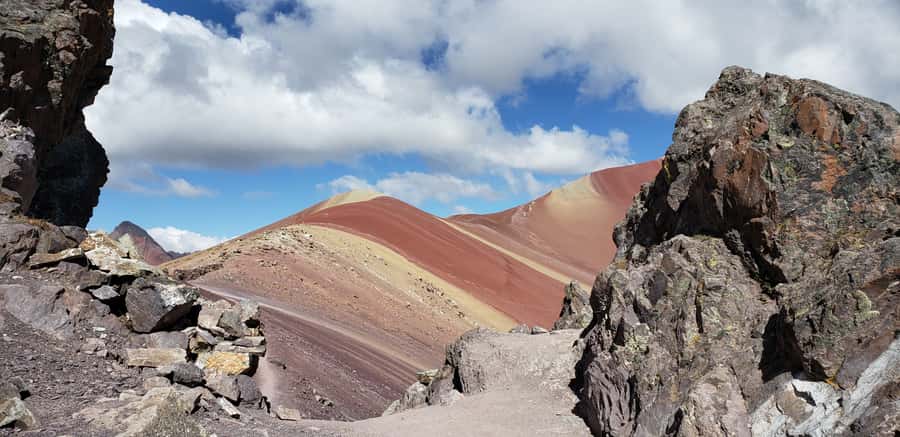 Peru: Rainbow Mountain and Red Valley View Point Tour - Included extras that change the value: poles and oxygen