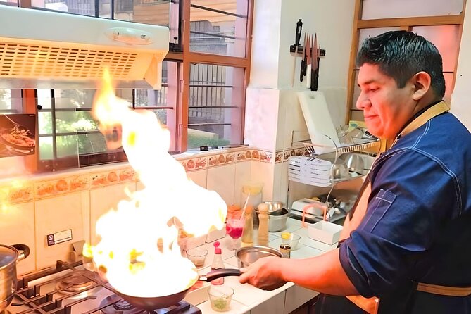 Vegan Peruvian Cooking Class Cocktails and Local Market in Cusco - Moving to the studio: hands-on cooking without the tourist fog